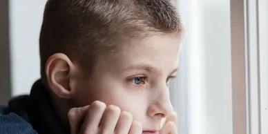 Portrait of a thoughtful young child in profile