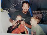 Portrait of an adult and child outdoors