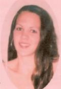 Portrait of a person against a light pink background